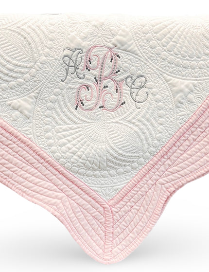 Personalized baby quilt — embroidered name included, heirloom baby shower gift