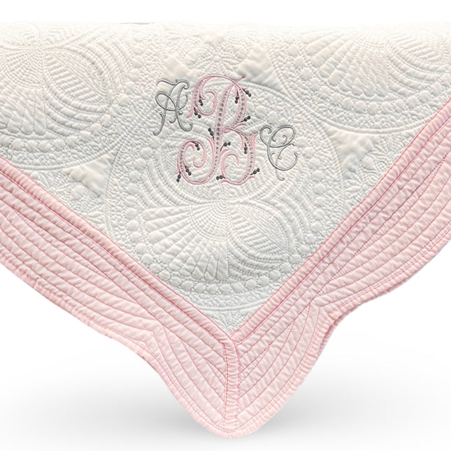 Personalized baby quilt — embroidered name included, heirloom baby shower gift