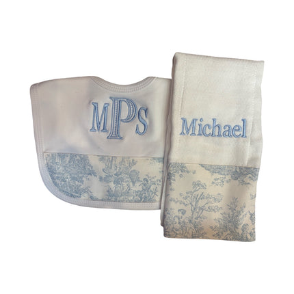 Personalized bib and burp cloth set — shown with embroidered name example