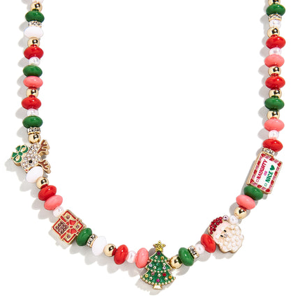 BaubleBar Kids’ Holiday Motif Necklace with red, pink, green and gold-tone beads and Christmas charms