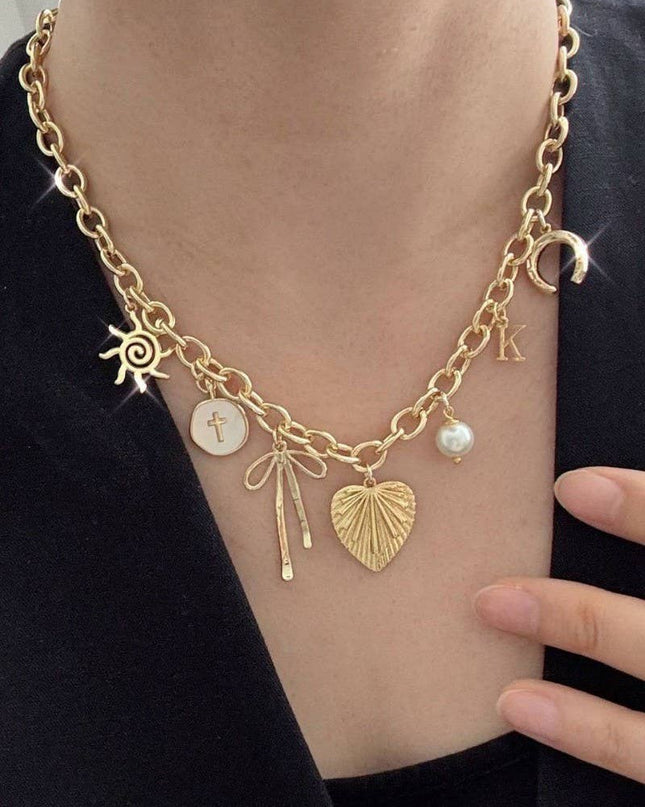 SUN BOW PEARL CROSS DISC  CHARM NECKLACE