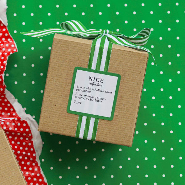 Ella B. Nice Defined Candle in kraft gift box with green and white striped bow