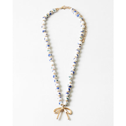White & Blue Ceramic Bead Gold Bow Necklace