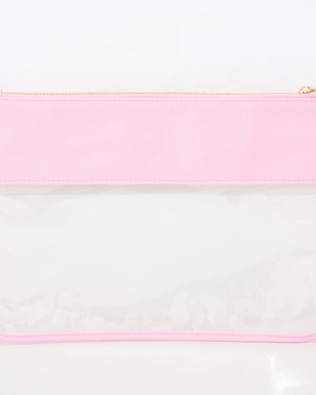 The Allie clear pouch — shown open with contents