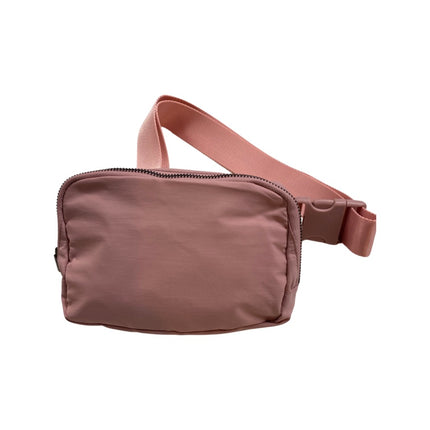 The Keely belt bag — lifestyle shot shown in use