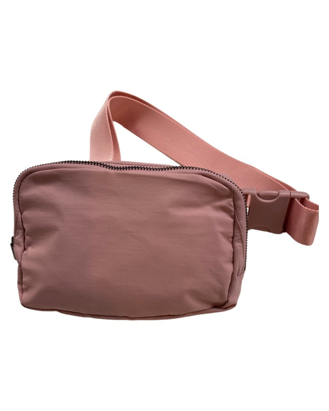 The Keely belt bag — lifestyle shot shown in use