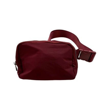 The Keely belt bag — shown being worn around waist