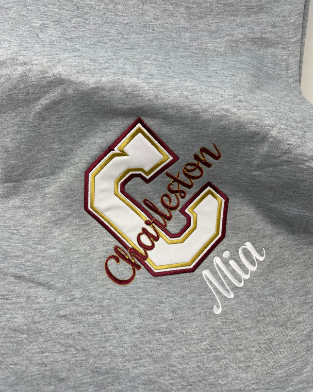 Personalized college sweatshirt blanket — shown folded, great graduation gift
