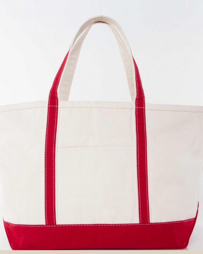 Personalized medium boat bag — lifestyle shot at beach