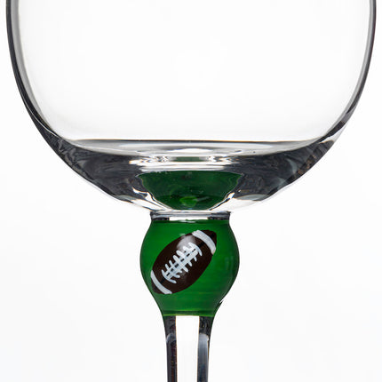 The Giving Glass Football — lifestyle shot on table