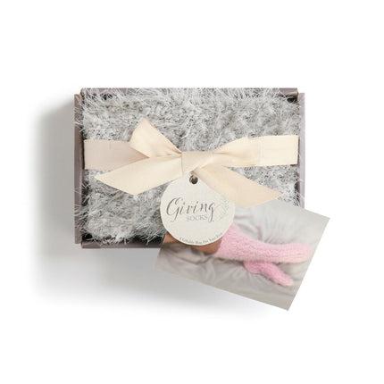 The Giving Socks — shown in packaging
