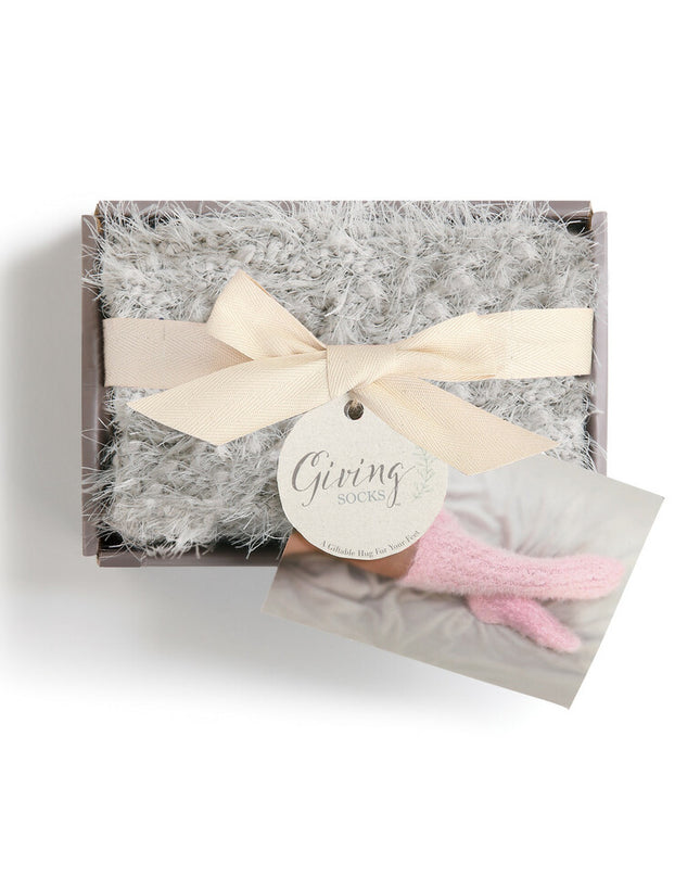The Giving Socks — shown in packaging