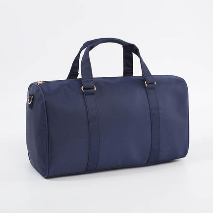 The Isabel nylon weekender bag — shown open with compartments