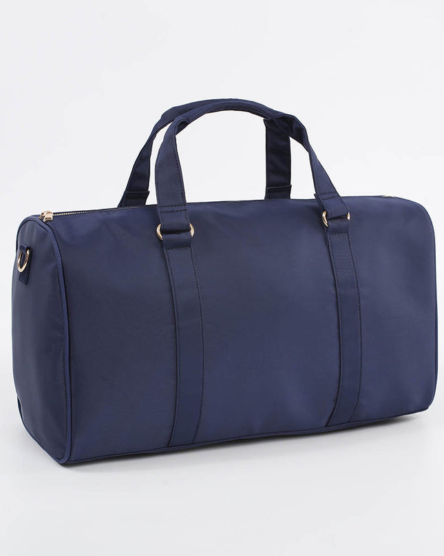 The Isabel nylon weekender bag — shown open with compartments